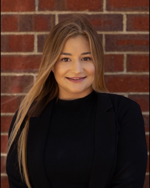 Claire, Director of Compliance